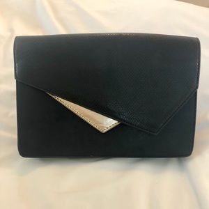 NWT Black and gold Bebe Clutch